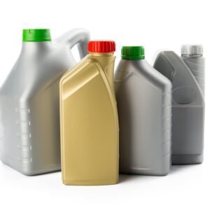 Plastic bottles from automobile oils isolated on white